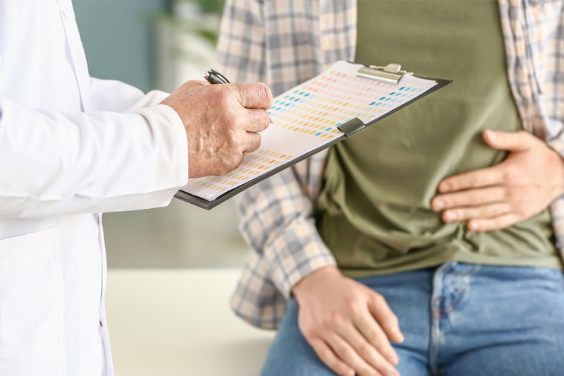 A patient at a urologist clinic receiving an assessment