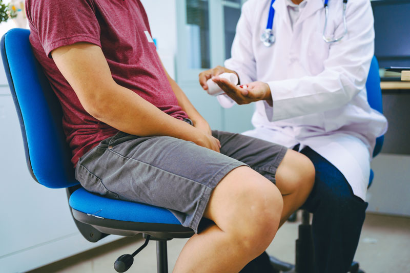 A doctor providing a consultation for prostate-related concerns